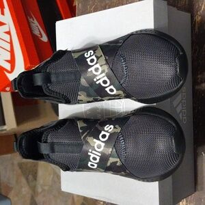 NWT pure motion Adidas. Brand new never even been tried on. Size 8.5